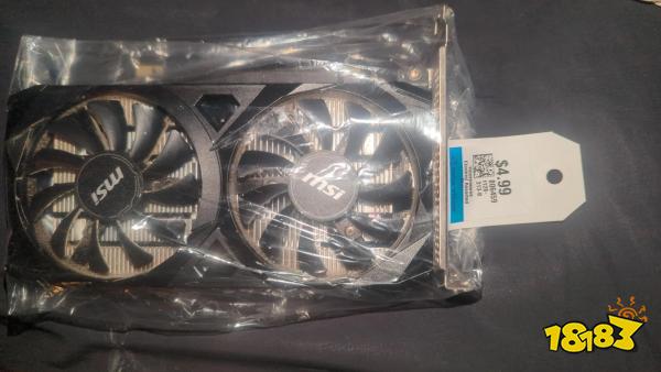 An MSI graphics card in a plastic bag is priced at '$4.99' with a tag from Value Village.