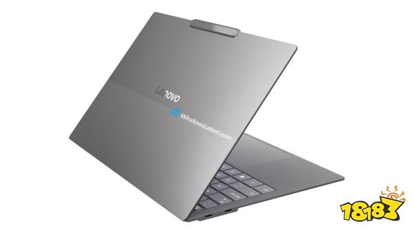 A Lenovo laptop with a sleek, silver design is displayed partially open, showcasing the back of the screen with a 'WindowsLatest.com' watermark.