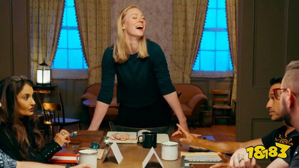 Deborah Ann Woll stands over a table as the Dungeon Master of Tales From Woodcreek