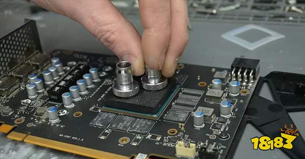 A person is attaching cooling fittings to a circuit board labeled 'MS-V327 VCR1.0'.