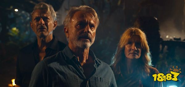 Jeff Goldblum, Sam Neill, and Laura Dern stand together in Jurassic World: Dominion