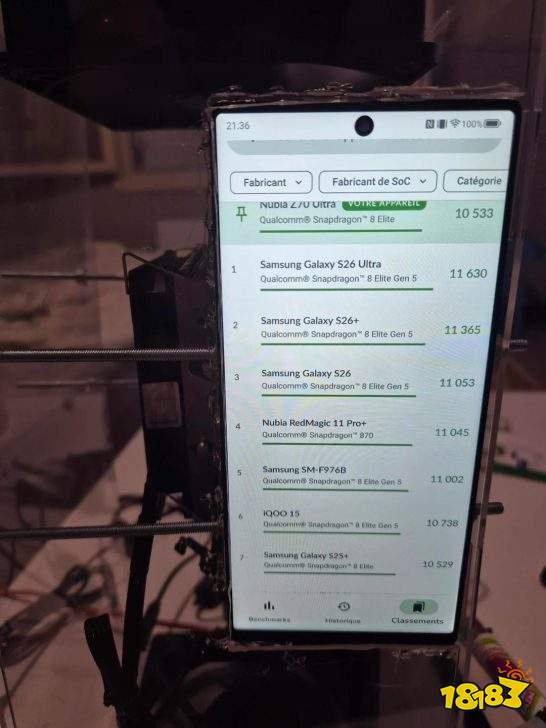 A smartphone screen displays benchmark rankings with the Samsung Galaxy S26 Ultra powered by Qualcomm Snapdragon 8 Elite Gen 5 leading, showing a score of 11,630.