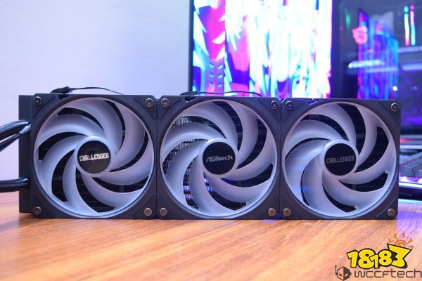 An ASRock cooling system with three large fans labeled